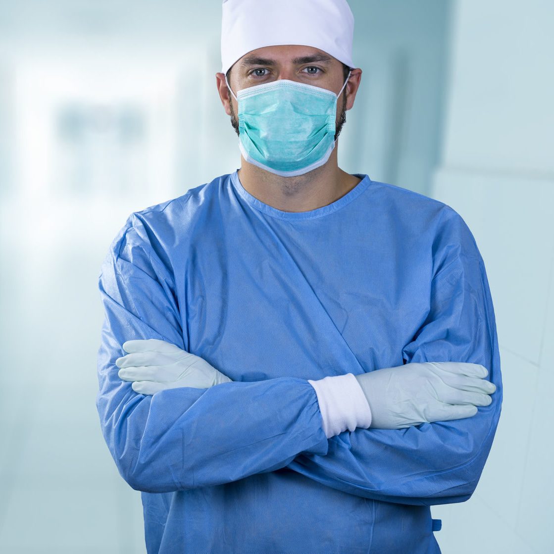 62789423 - doctor surgeon standing in the hospital hallway
