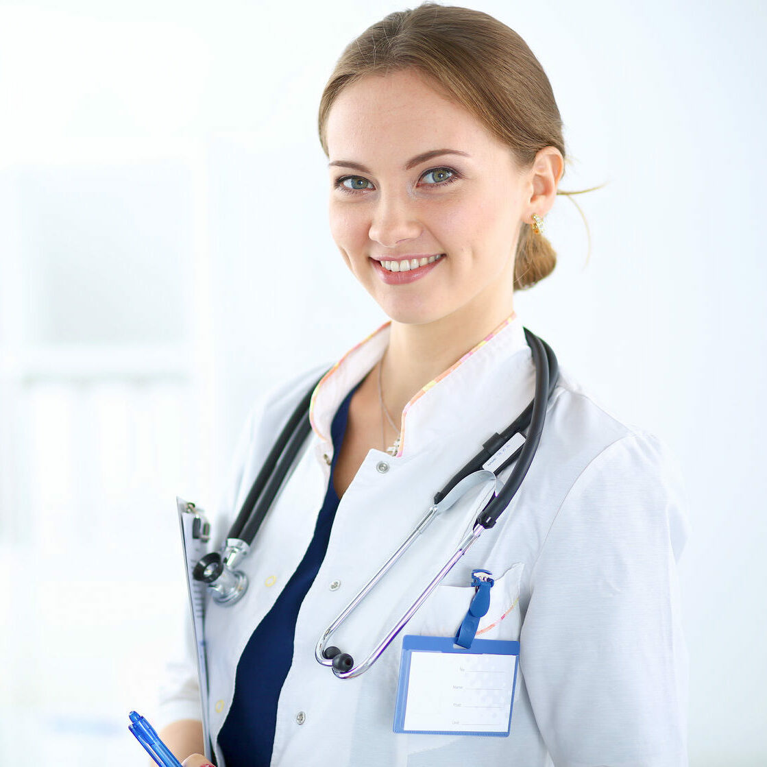 39718746 - woman doctor standing with folder at hospital
