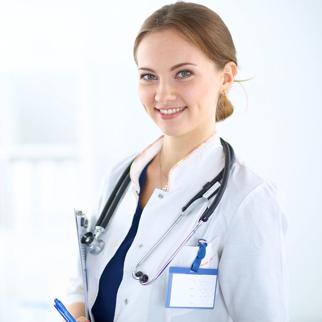 39718746 - woman doctor standing with folder at hospital
